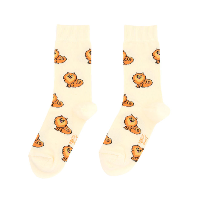 Chaussettes jaunes pales avec motifs spitz, de la marque Coucou Suzette.