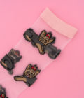 Chaussettes transparentes avec motifs Yorkshire de la marque Coucou Suzette.
